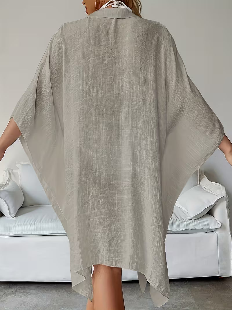 Chemise de plage loose — Vogue Française
