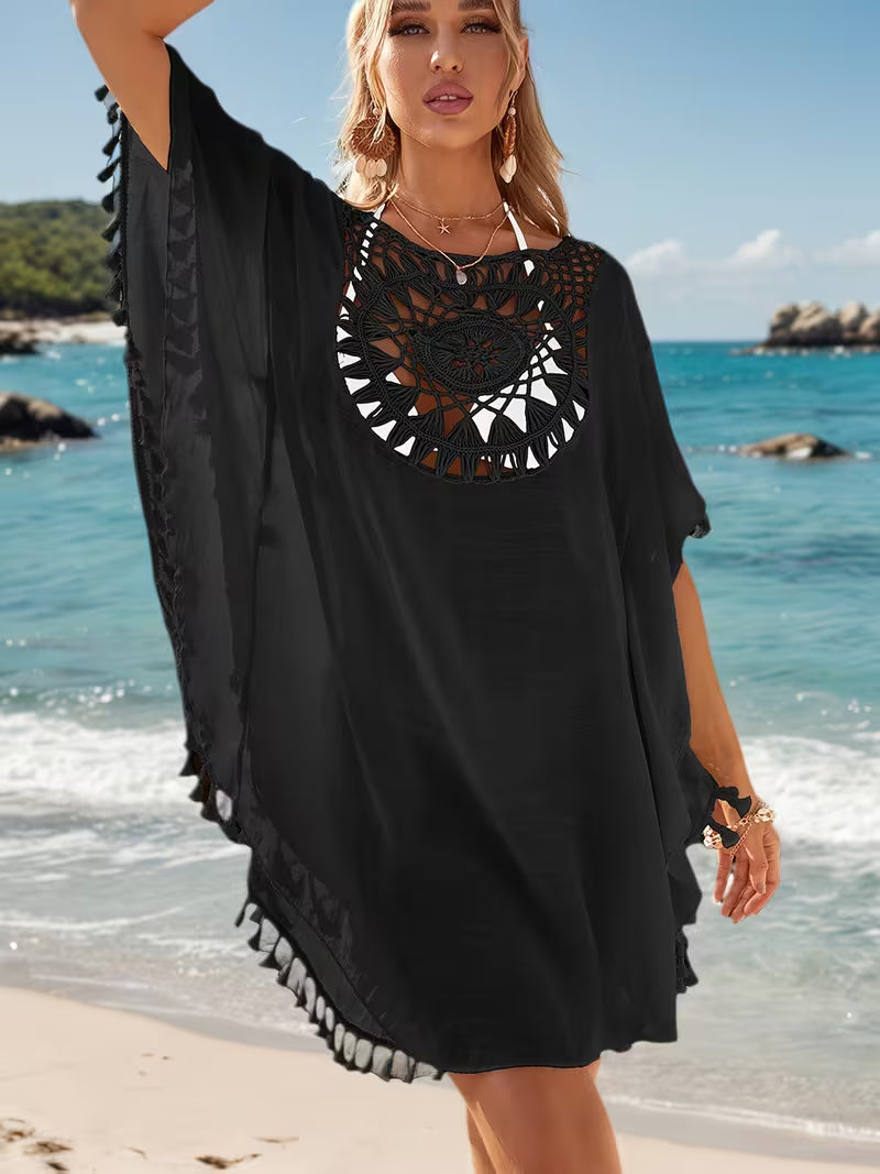 Robe de plage en crochet floral style patchwork — Vogue Française