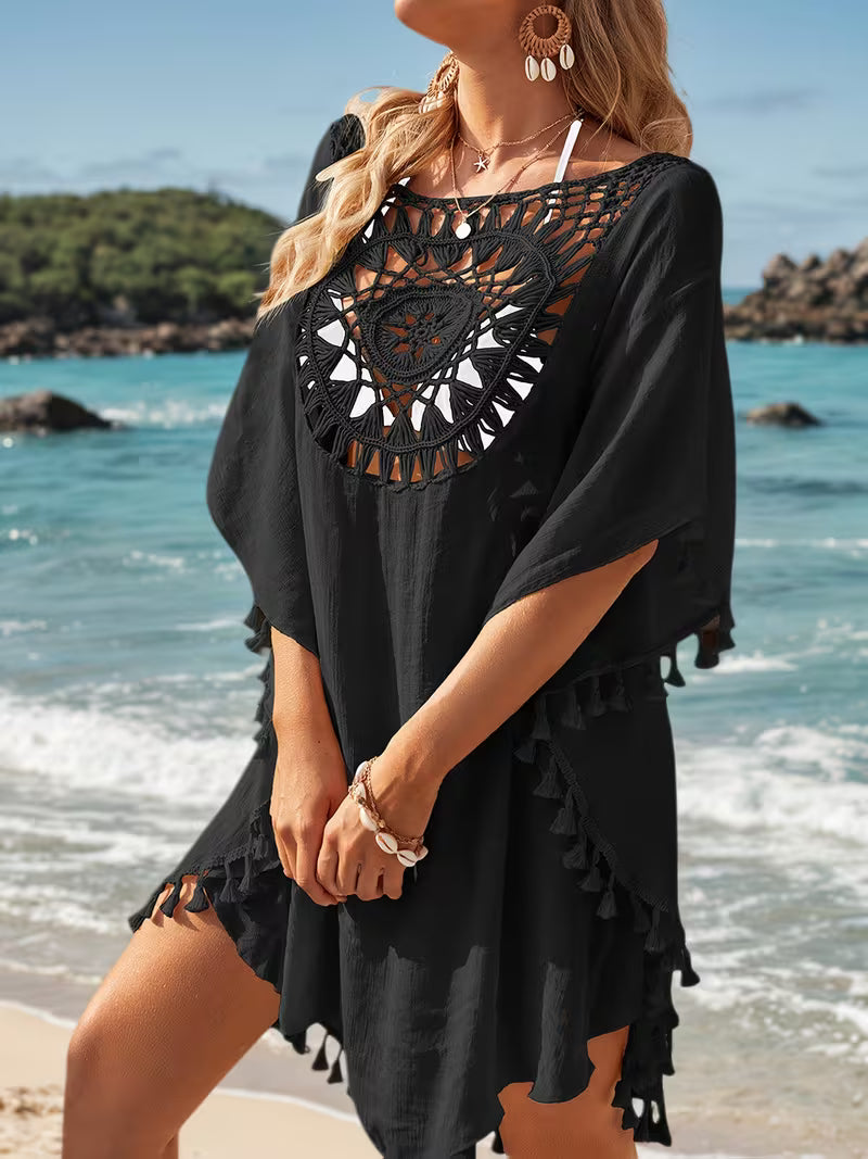 Robe de plage en crochet floral style patchwork — Vogue Française