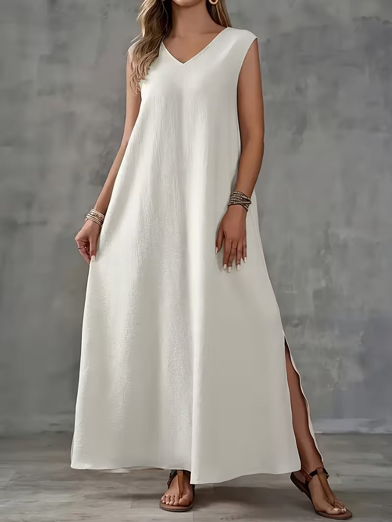 Robe longue blanche subtile — Vogue Française