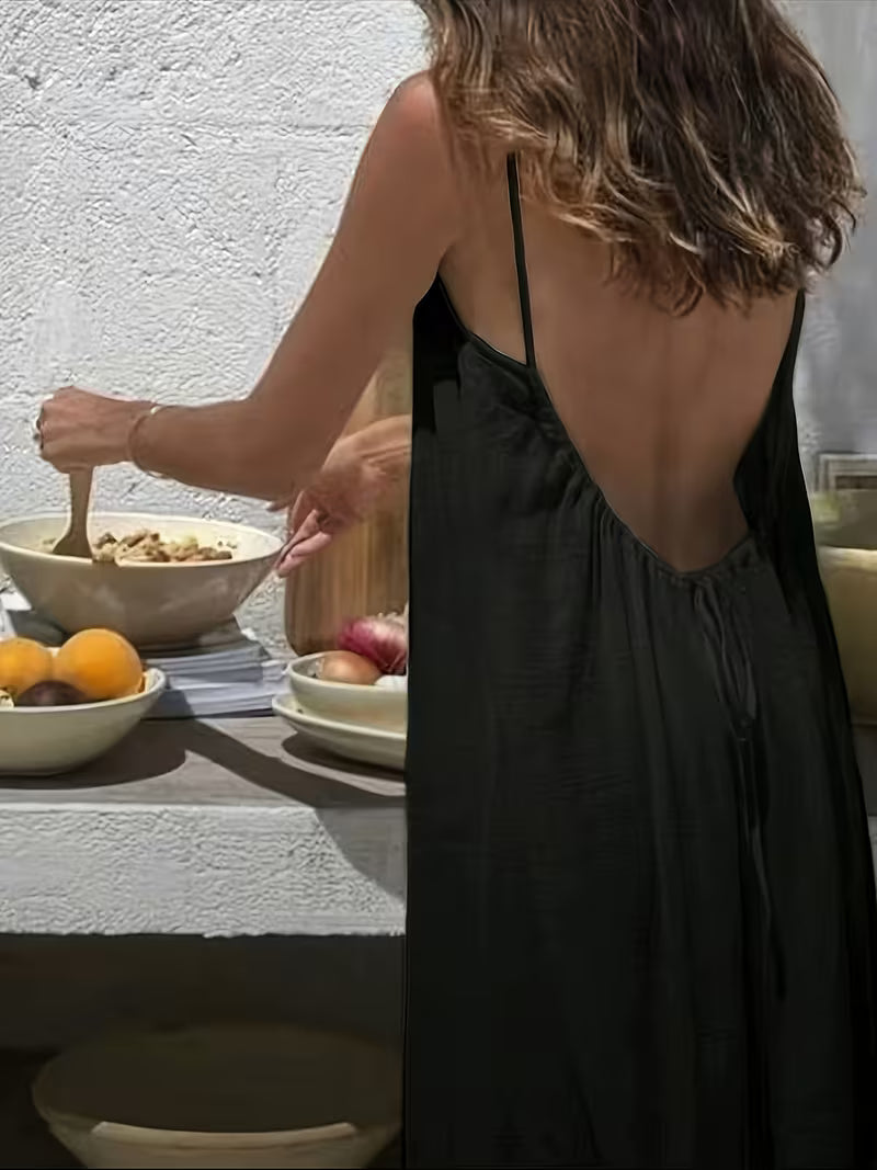 Robe longue légère et sensuelle — Vogue Française