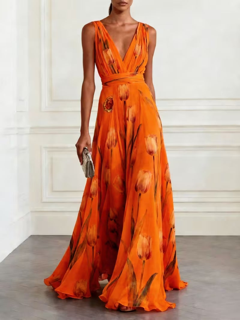 Robe de cocktail longue vaporeuse à imprimé tulipes — Vogue Française