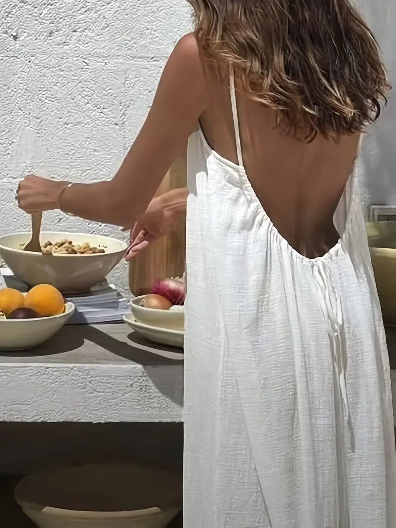Robe longue légère et sensuelle — Vogue Française