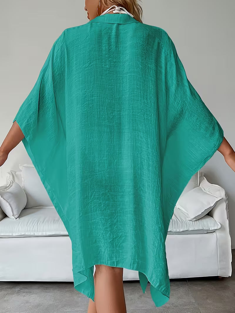 Chemise de plage loose — Vogue Française