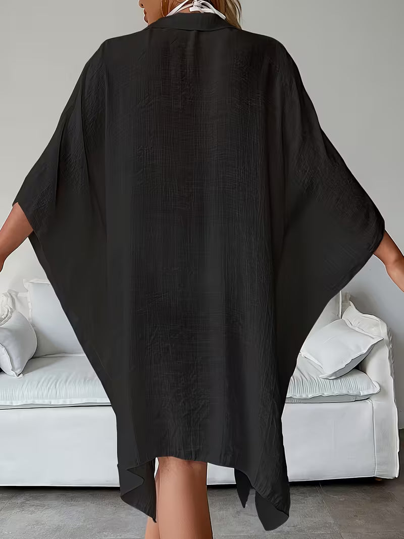 Chemise de plage loose — Vogue Française