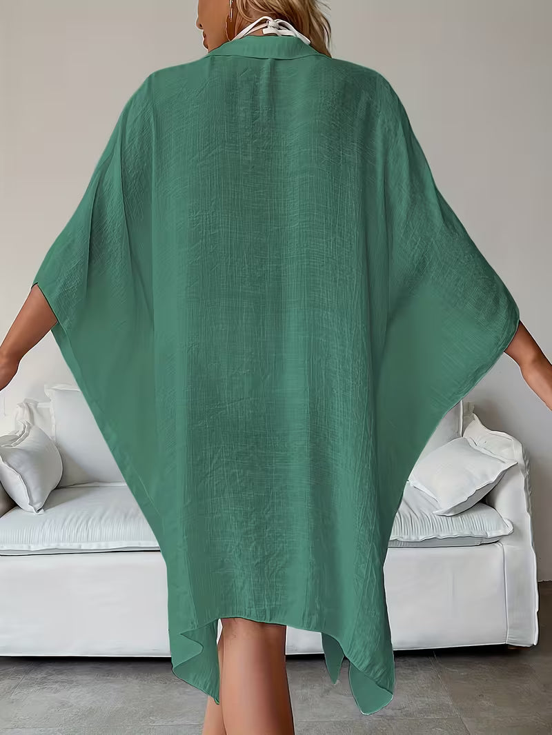 Chemise de plage loose — Vogue Française