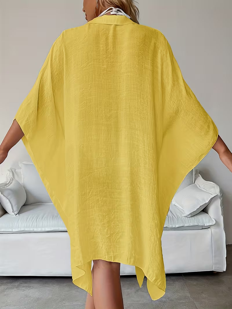 Chemise de plage loose — Vogue Française