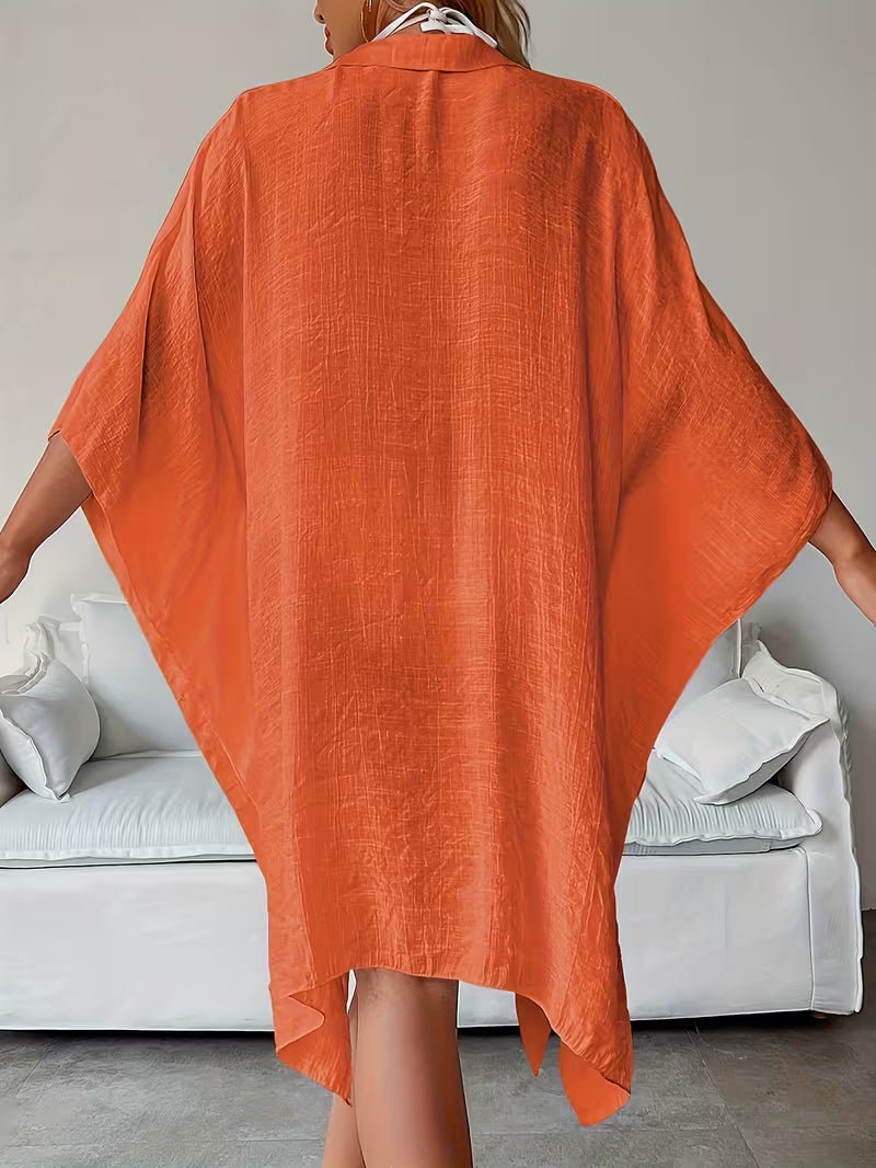 Chemise de plage loose — Vogue Française