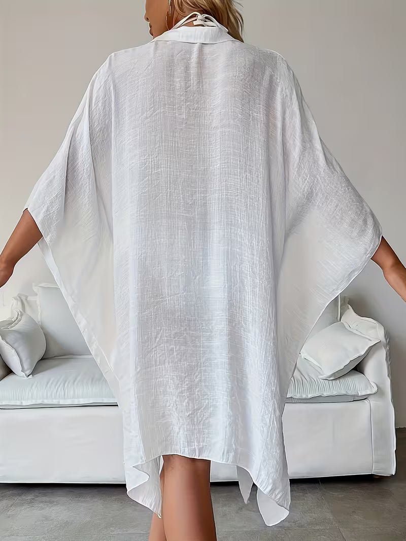 Chemise de plage loose — Vogue Française