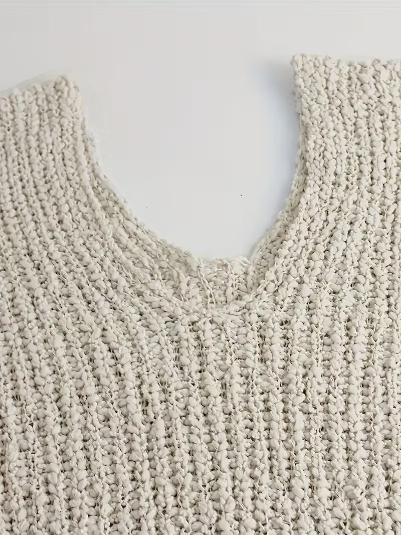 Pull élégant loose en tricot léger — Vogue Française