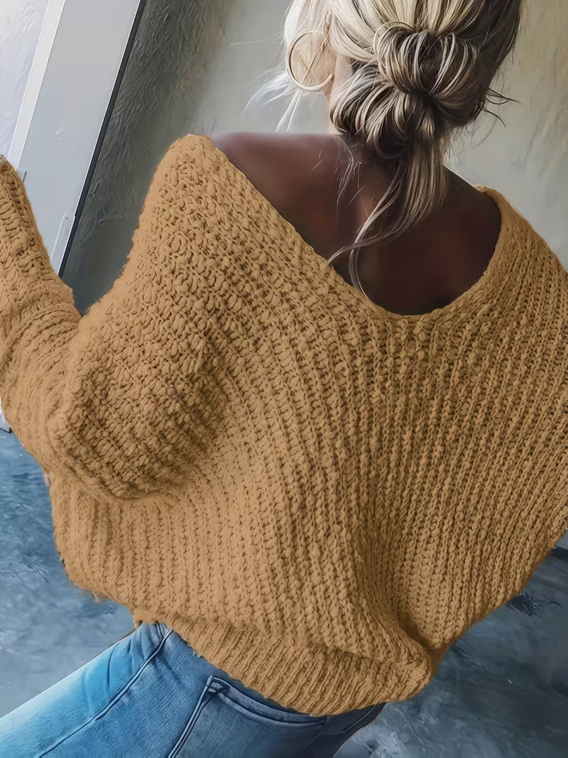 Pull élégant loose en tricot léger — Vogue Française
