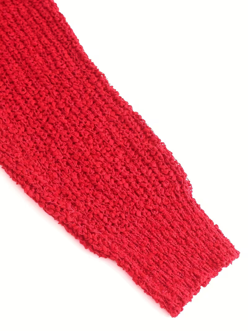 Pull élégant loose en tricot léger — Vogue Française