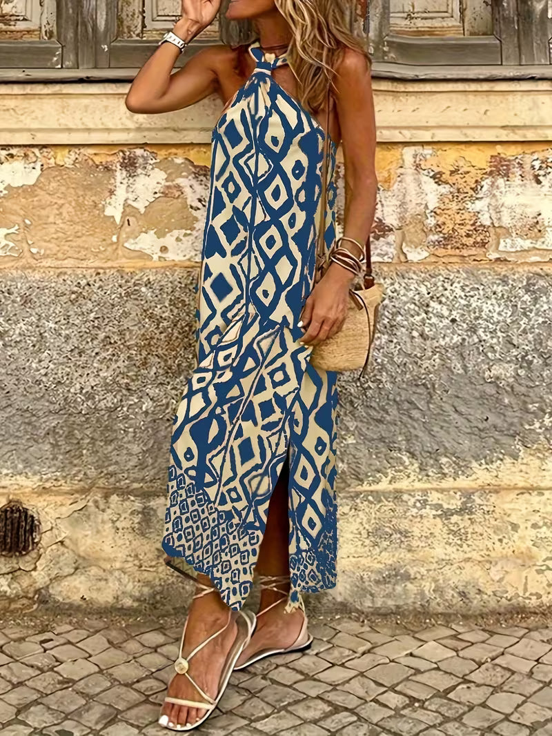 Robe longue raffinée à imprimé géométrique avec col halter — Vogue Française