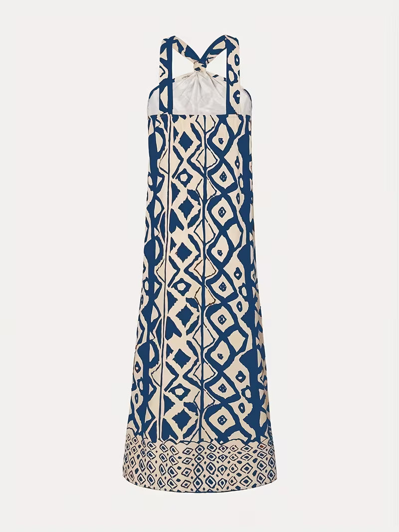Robe longue raffinée à imprimé géométrique avec col halter — Vogue Française
