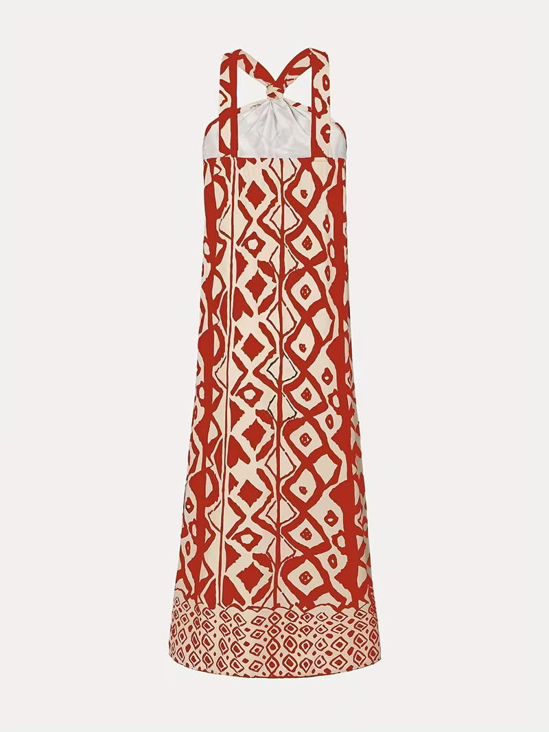 Robe longue raffinée à imprimé géométrique avec col halter — Vogue Française